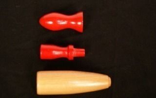 Three custom wooden rolling pin handles, finished in red and clear. Available in bulk for kitchenware, rolling pin production, and food industry manufacturing.