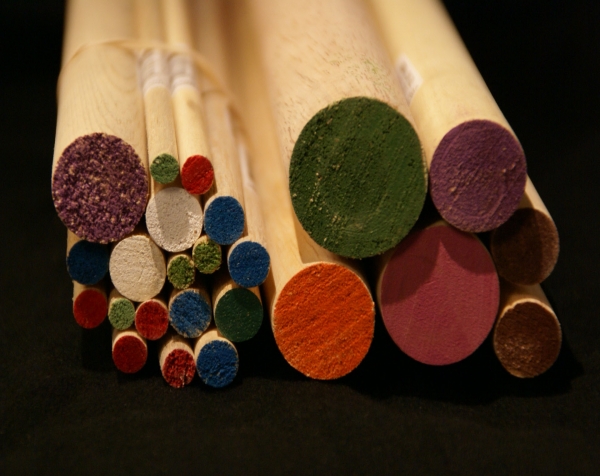 Collection of color and UPC bar coded wood Dowel Rods in various diameters which are determined by the specific color of the dowel end.