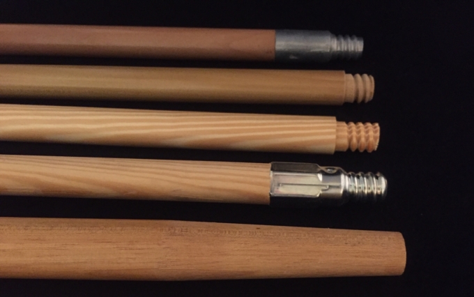 Variety of wood mop and wood broom handles showing different hardware and secondary operations.