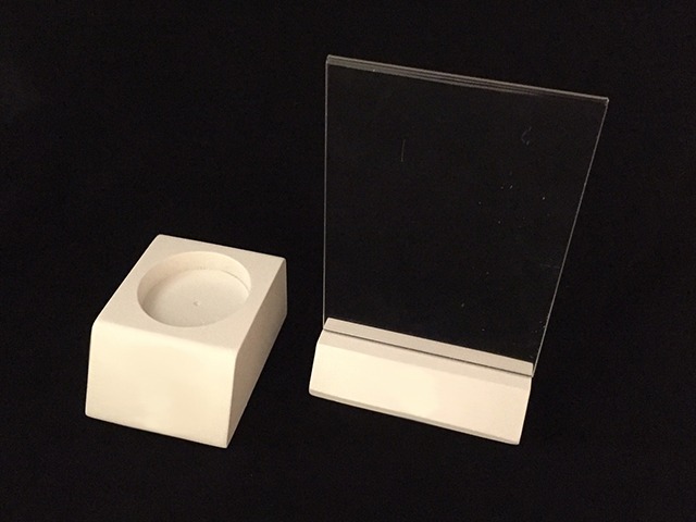 Painted wooden menu holder with an acrylic insert and a custom wood bottle glorifier for restaurant and bar displays.