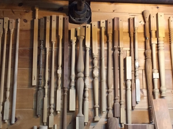 Wall display of various wooden balusters