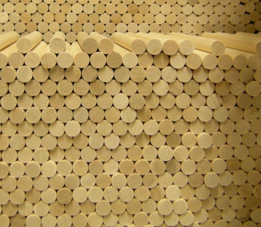 pile of wooden dowels