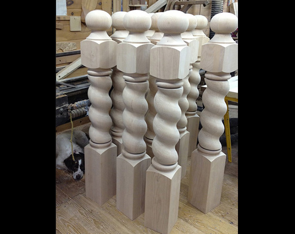 Several alder spiral newels with square bottom and ball finial on top
