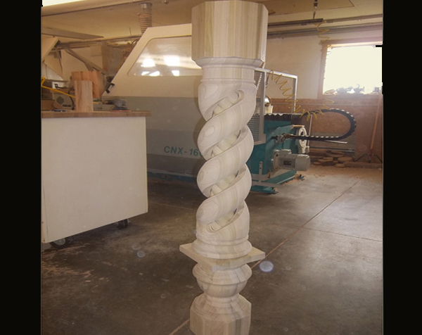 Rope twist within another rope twist wood newel post