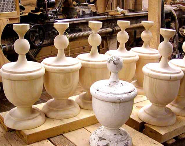 Grouping of unfinished wood finials that were custom made to match a customer sample