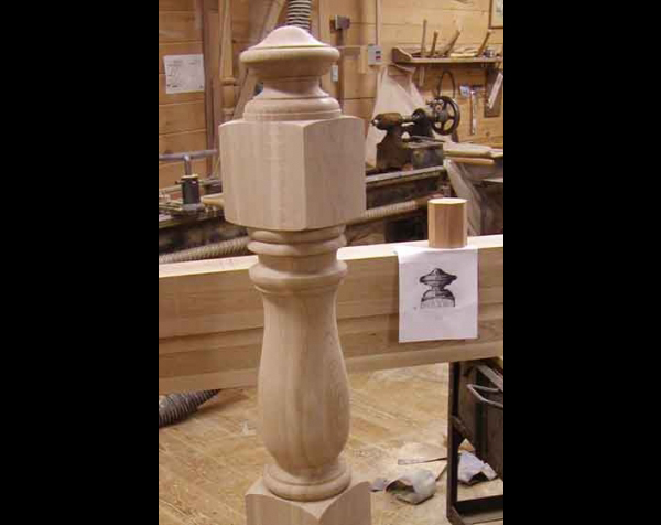 Single wood newel post with finial
