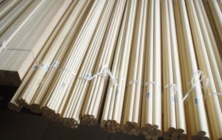 Barcoded wooden dowels and square rods, available in bulk for manufacturers and high-volume production.