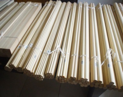 Barcoded wooden dowels and square rods, available in bulk for manufacturers and high-volume production.