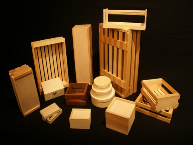 A collection of custom wood boxes and crates designed for storage, shipping, and specialty applications.