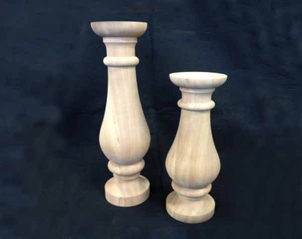 Two large unfinished diameter wooden balusters