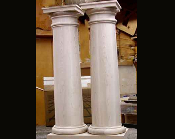 Two soft maple Tuscon wood columns with capital and base