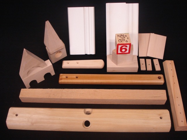 A selection of custom wood moulding profiles used in various woodworking projects.