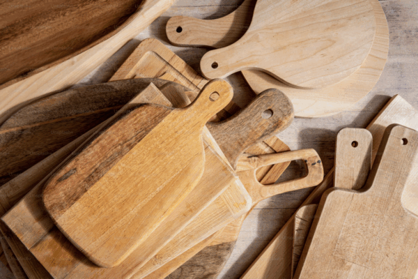 Variety of Wood Cutting Boards by Grain and Species Assorted wood cutting boards showing variations in grain, species, and construction.