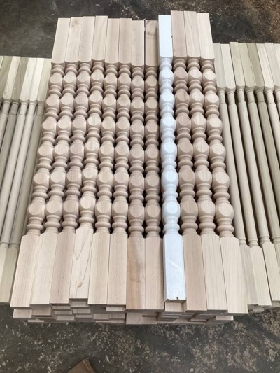 Hard Maple Interior Paint-Grade Wood Balusters Hard maple paint-grade wood balusters stacked in rows for interior use.