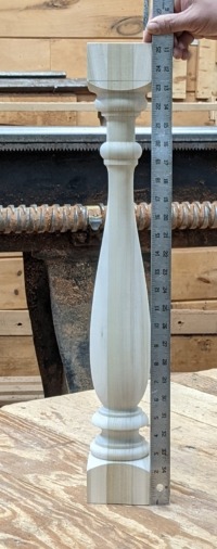 Approved Mahogany Baluster Sample Custom-turned wood baluster sample showing the approved vase profile, produced in poplar prior to the full mahogany production run